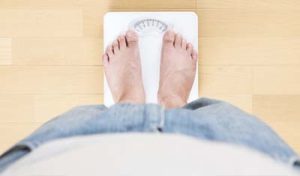 you look at the display of a bathroom scale from the point of view of a stocky person